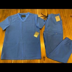 Brand new with tags - Jaanuu scrubs: Jogger and tee. Color royal blue.
